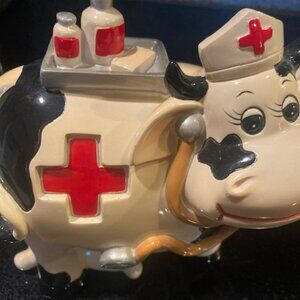 Antique Bank Cow Dressed as a Nurse